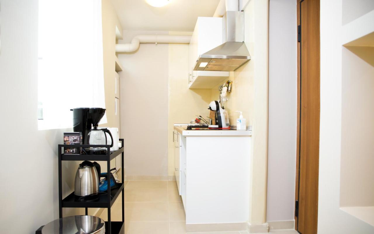 Praxitelis Luxury Apartments Афины Экстерьер фото